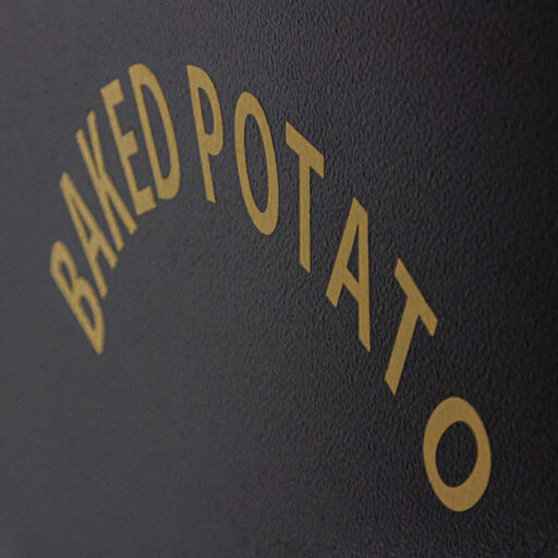 Bakt potetovn tekst closeup