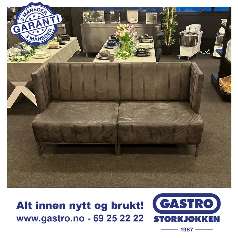 Moderne benkesofa i slitesterkt kunstskinn 180 x 72 x 90 cm.